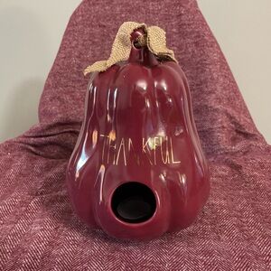 Rae Dunn maroon and gold-accented “Thankful” decorative gourd birdhouse.